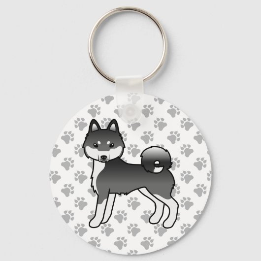 黒と白のアラスカン・クリー・カイ かわいい犬と足 キーホルダー (正面)