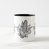 黒と白のコーンのコブのアイコンと離れの ツートーンマグカップ (中央)