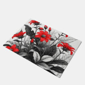 黒と白の植物に赤い花 ドアマット (アングル)