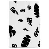 黒と白の熱帯夏離れのパターン ミディアムペーパーバッグ (正面)