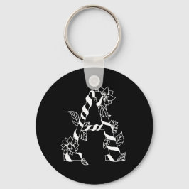 黒と白の花が絡む文字「A」 キーホルダー