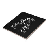 黒と白の花が絡む文字「A」 タイル (側面)