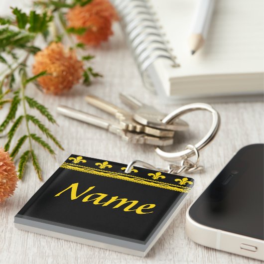黒と金ゴールドの(紋章の)フラ・ダ・リ文字と数字 キーホルダー (正面右)