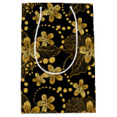 黒と金ゴールド熱帯葉の花のパターン ミディアムペーパーバッグ (正面)
