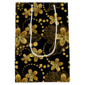 黒と金ゴールド熱帯葉の花のパターン ミディアムペーパーバッグ (裏面)