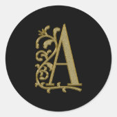 黒に巻き付いたモノグラム ラウンドシール (正面)