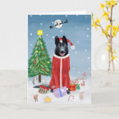 黒のジャーマンシェパード犬の雪のクリスマスプレゼント カード (黄色い花)