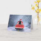 黒のジャーマンシェパード スノーがクリスマスに座っている カード (黄色い花)