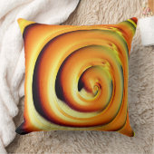 黒の上に巨大な光沢のあるオレンジ色のスパイラル クッション (ブランケット)