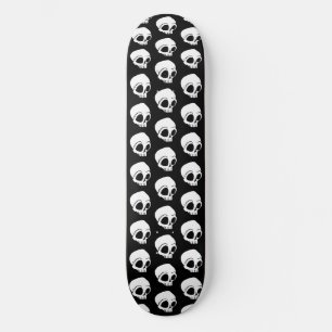 黒の小さな白いスカル スケートボード