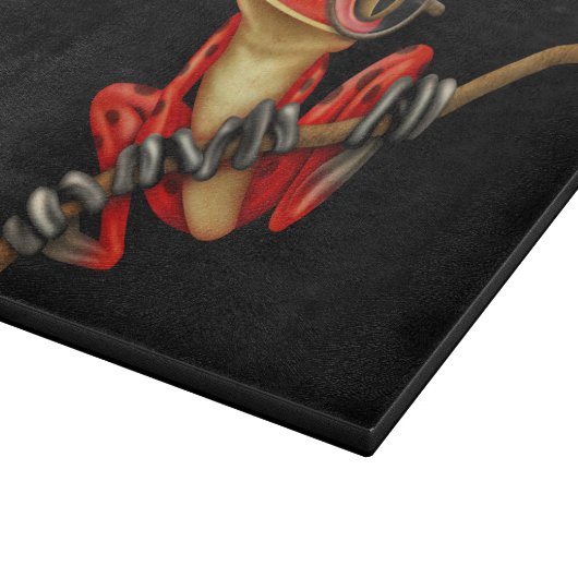 黒の目ガラスを持つかわいく赤いアマガエル カッティングボード (角)