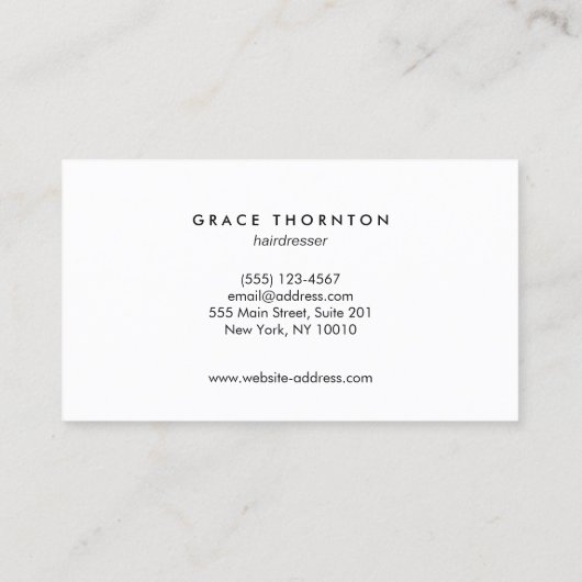 黒はっきりしたモダン白美容師サロン 名刺 (裏面)