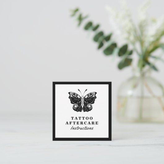 黒はっきりした蝶タトゥーアフターケアの指示 スクエア名刺 (スタンド正面)
