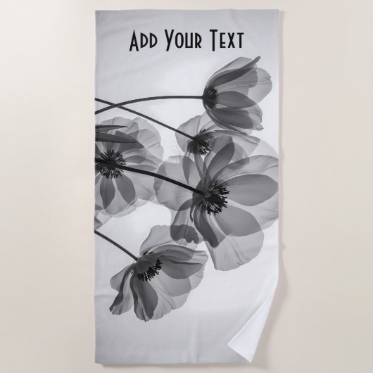 黒エレガントと白のケシの花 ビーチタオル (正面)