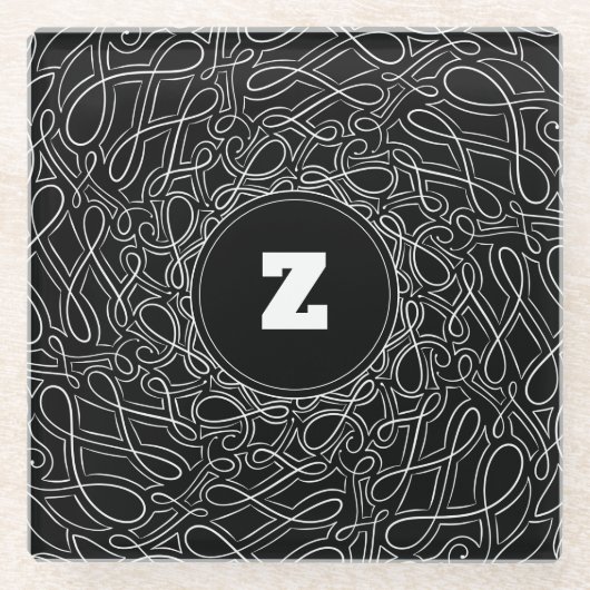 黒モノグラムのと白のパターン旋回モダン ガラスコースター (正面)
