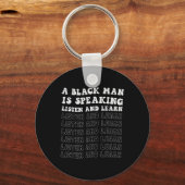 黒人は黒人話と聞黒人学という キーホルダー (正面)