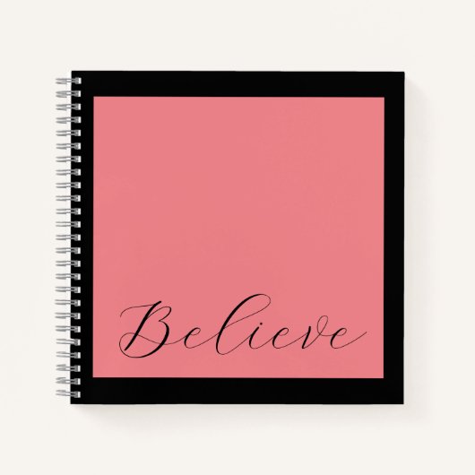黒信じ文字コーラルピンク背景 ノートブック (正面)