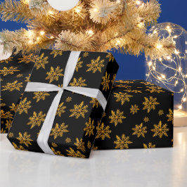 黒地にクリスマスの金色のクリスタルスノーフレーク ラッピングペーパー