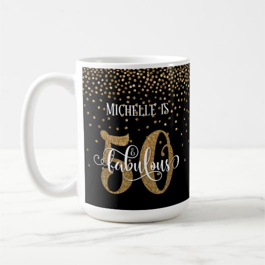 黒地にゴールドの紙吹雪と「50 & Fabulous」 コーヒーマグカップ (左)