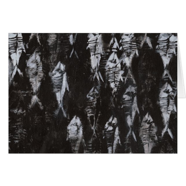 黒地に見える白身化石 (正面横)