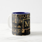 黒地に金色のエジプト象形文字イニシャル ツートーンマグカップ (正面左)