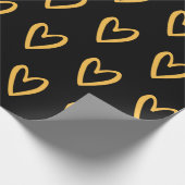 黒手の黄色のハート ラッピングペーパー (角)