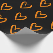 黒手の黄色のハート ラッピングペーパー (角)