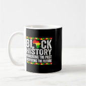 黒歴史教育は自由の本ブラックヒー コーヒーマグカップ (左)