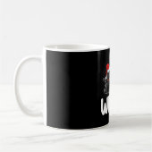 黒猫がクリスマスツリーを押している面白いデザイン コーヒーマグカップ (左)