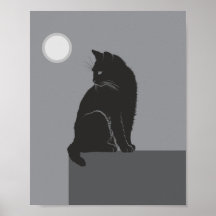 黒猫がテーブルに座っている