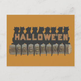 黒猫が丸太に座る影 ポストカード