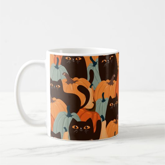 黒猫とカボチャの継ぎ目のないかわいい柄 コーヒーマグカップ (左)