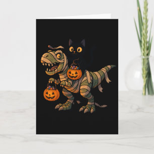 黒猫に乗られたミイラのティラノサウルス – かわいいハロウィーンの恐竜 カード