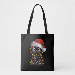 黒猫のクリスマスツリーのライト 冗談めいたサンタの子猫 トートバッグ