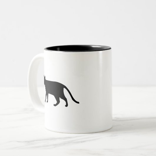 黒猫のシルエットの子ネコののどを鳴らす音の猫の鳴き声のシンプルの芸術 ツートーンマグカップ (正面左)