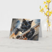 黒猫のロックスターがアコースティックギターを弾く空白 カード (黄色い花)