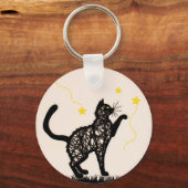 黒猫の遊び心あふれる星のイラスト キーホルダー (正面)