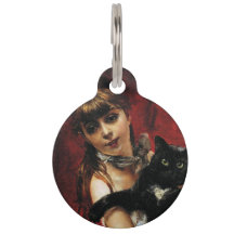 黒猫を腕に抱いた少女