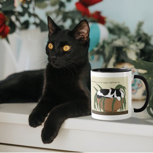 黒白のタキシード猫が寝ている観葉植物の鉢植えイラスト マグカップ
