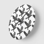 黒白のラベ飛んでいるン・リノ・カット ラウンド壁時計 (傾斜)