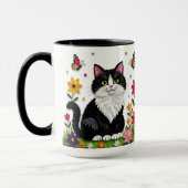 黒白の猫、花と蝶々 マグカップ (左)