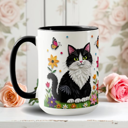 黒白の猫、花と蝶々 マグカップ
