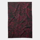 黒素朴色または暗赤色の背景に赤いスポンジ キッチンタオル (縦)