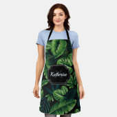 黒色の熱帯パターン エプロン (着用した状態)