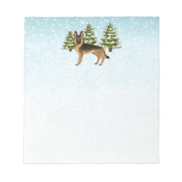 黒褐色のドイツの羊飼い犬の冬の森 ノートパッド