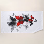 黒飛んでいると赤のモルフォ ビーチタオル (正面)