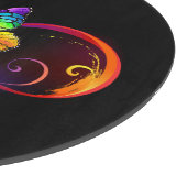 黒鮮やかに虹の蝶がある無限大 カッティングボード (角)