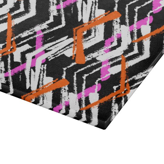 黒、オレンジ、ピンクの手描き矢印パターン カッティングボード (角)