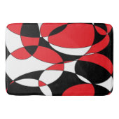黒、白、赤の楕円形のバスマット バスマット (正面)