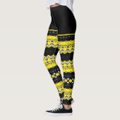 黒、黄色、白の部族柄 レギンス (左)